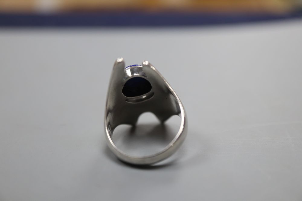 A post 1945 Georg Jensen sterling and cabochon lapis lazuli dress ring, design no. 139, size O, gross 9 grams.